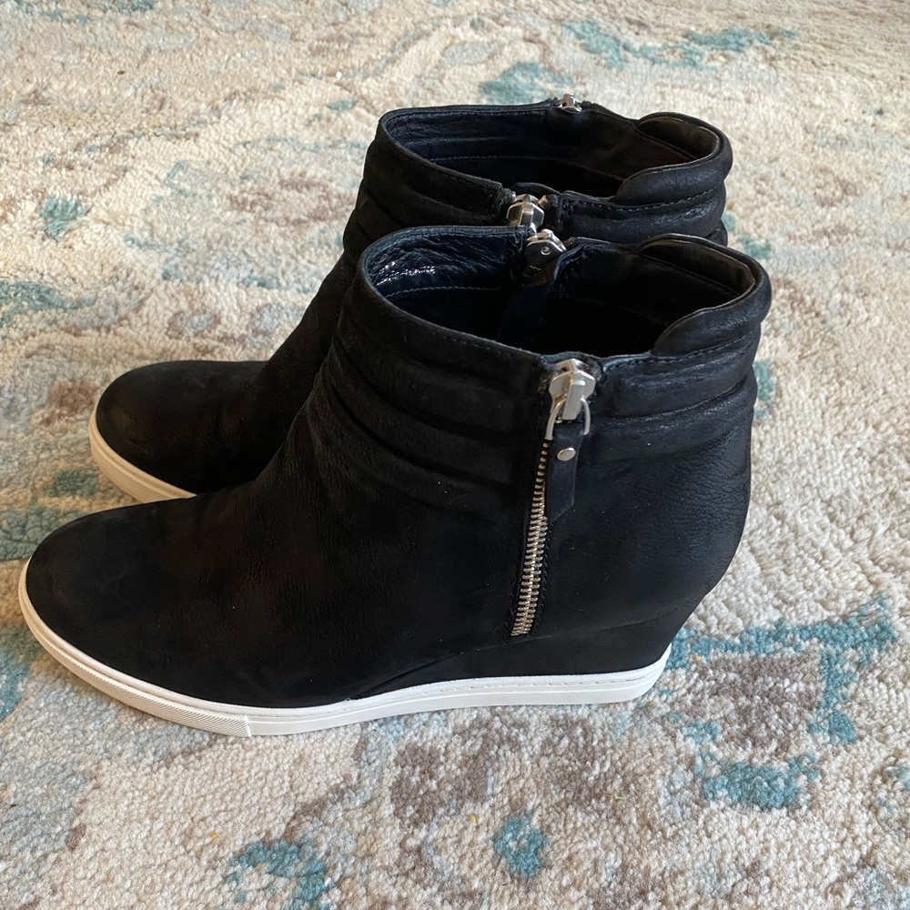 Preowned  black and white Linea Paolo 3” wedge booties with side zipper.